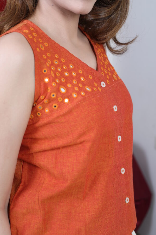 women’s green embroidered sleeveless top with navy blue pant cord set