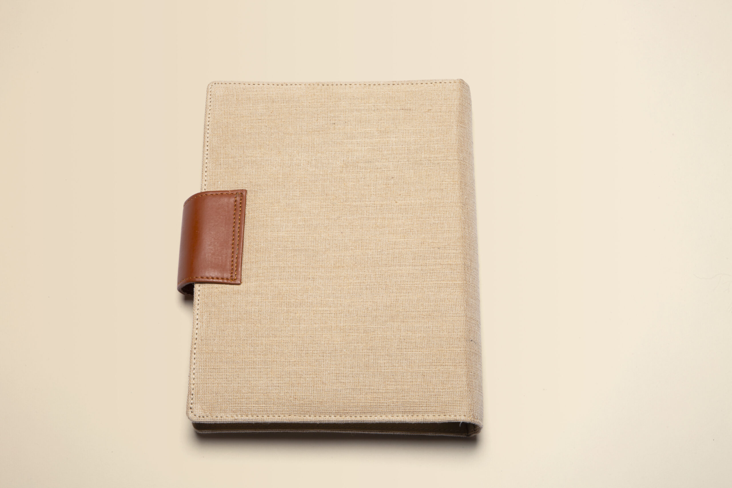 handcrafted linen diary with multicolor embroidered motif & leather closure handcrafted linen diary with multicolor embroidered motif & leather closure