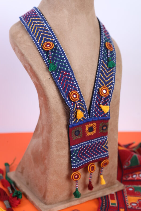 handcrafted embroidered long pendant necklace with tassel detailing