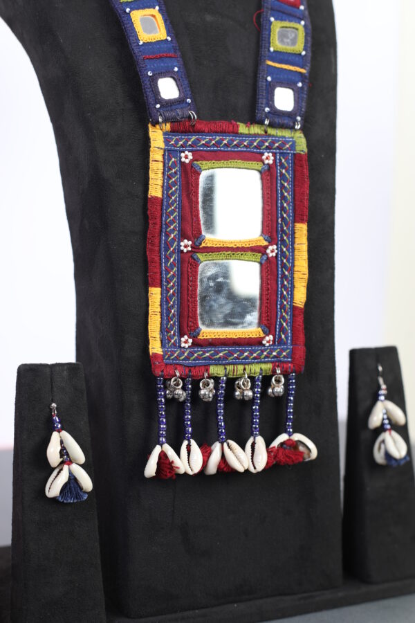 handcrafted Gormaati mirror pendant necklace with embroidered strap and shell drops