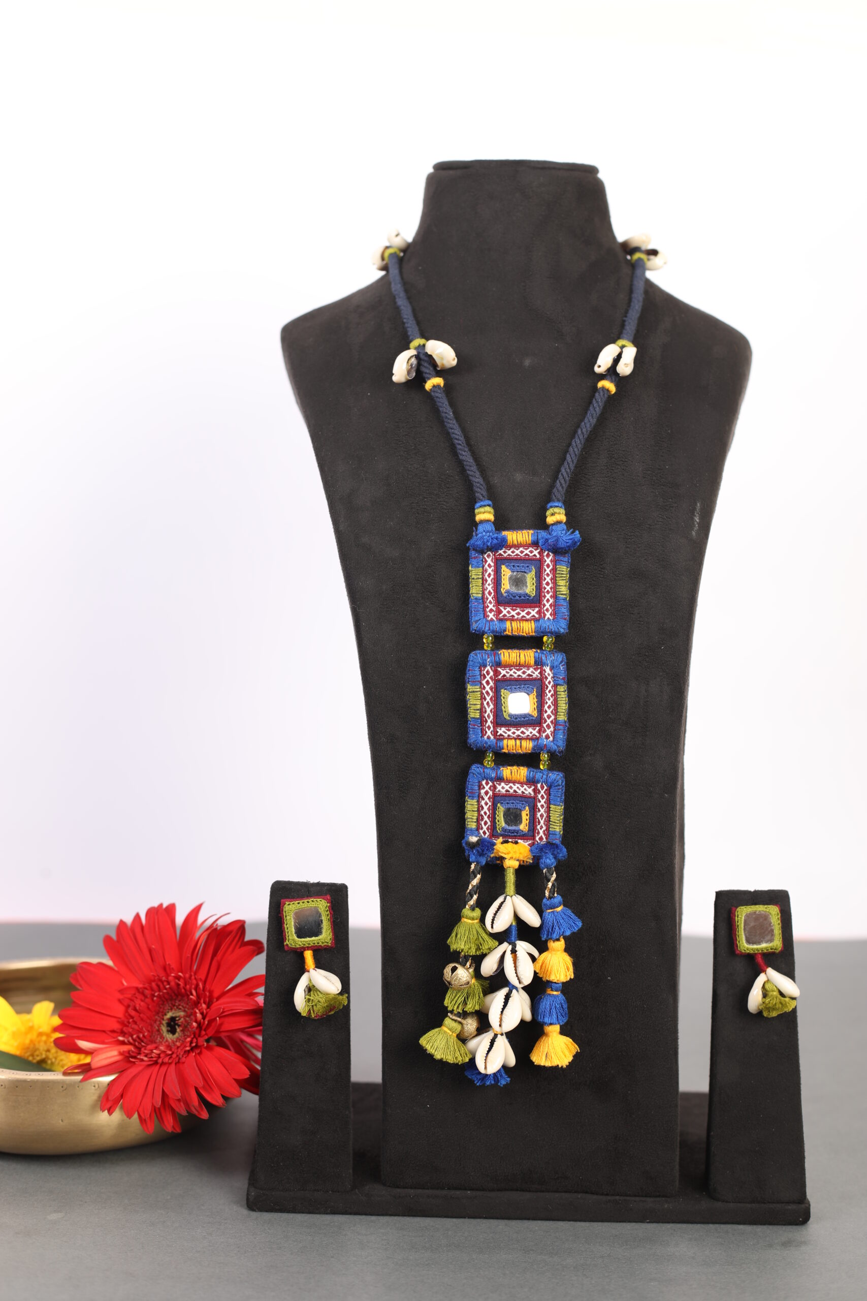 handcrafted Gormaati layered pendant necklace with mirror work and shell tassels