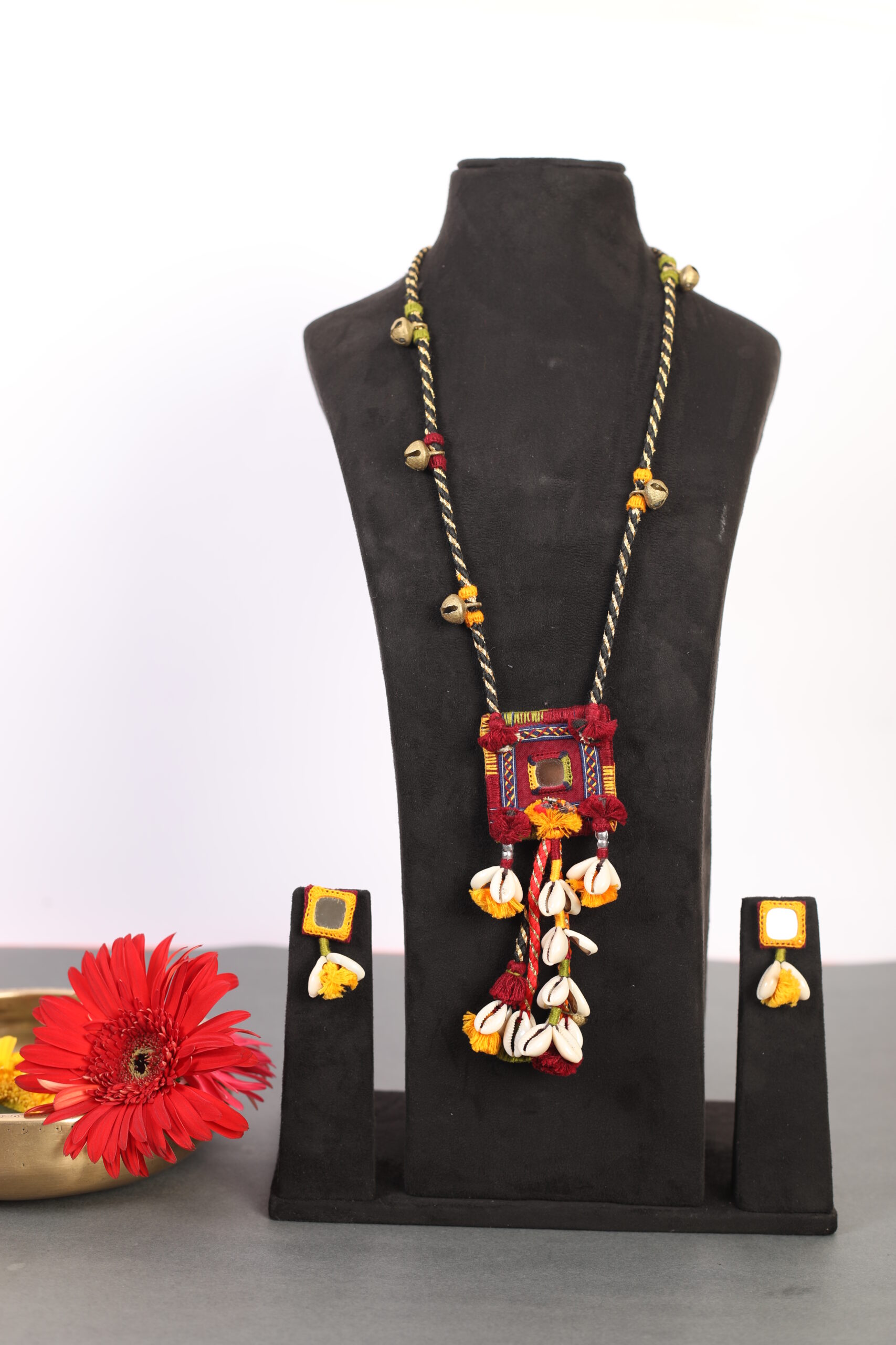 handcrafted Gormaati pendant necklace with mirror and shell tassels