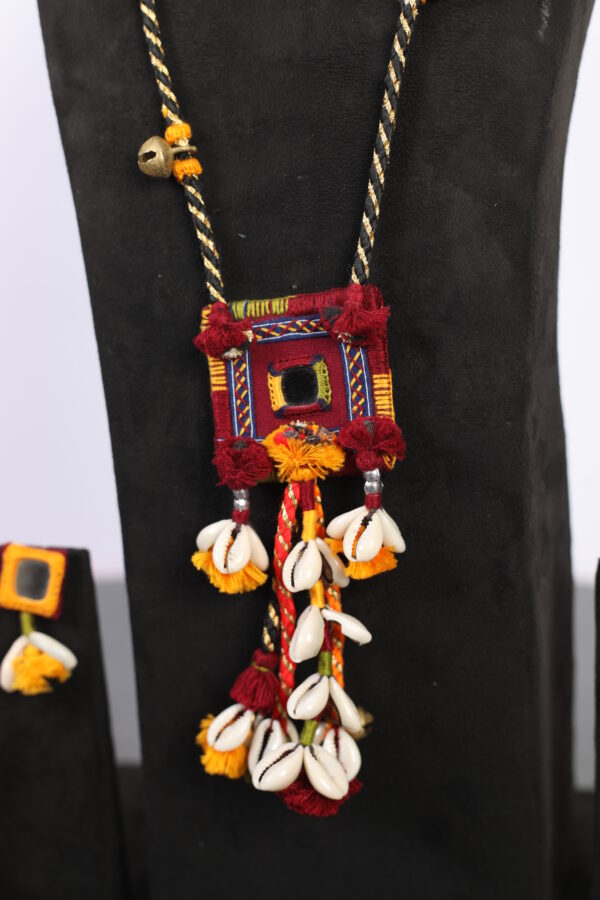 handcrafted Gormaati pendant necklace with mirror and shell tassels