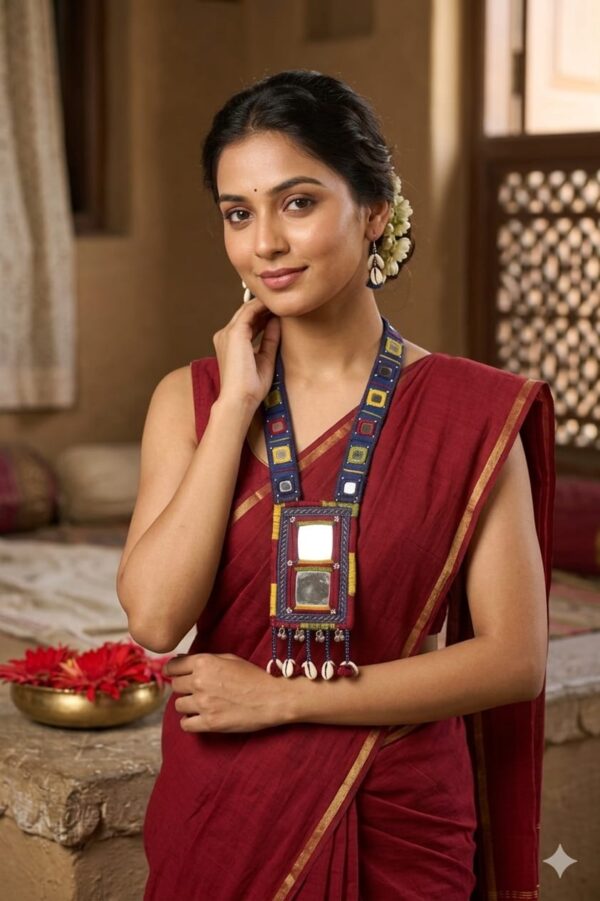 handcrafted Gormaati mirror pendant necklace with embroidered strap and shell drops